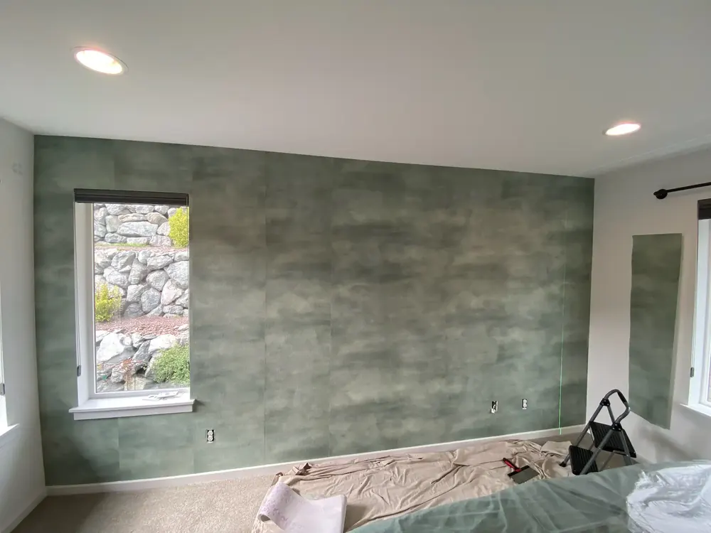 Floral wallpaper creating a focal point in a furnished room